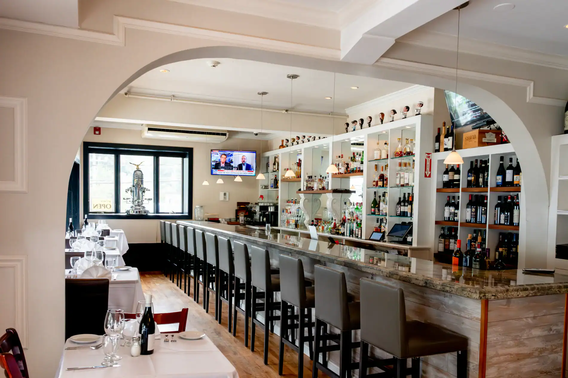 Upscale restaurant bar with stylish seating and a well-stocked selection of wines and spirits.
